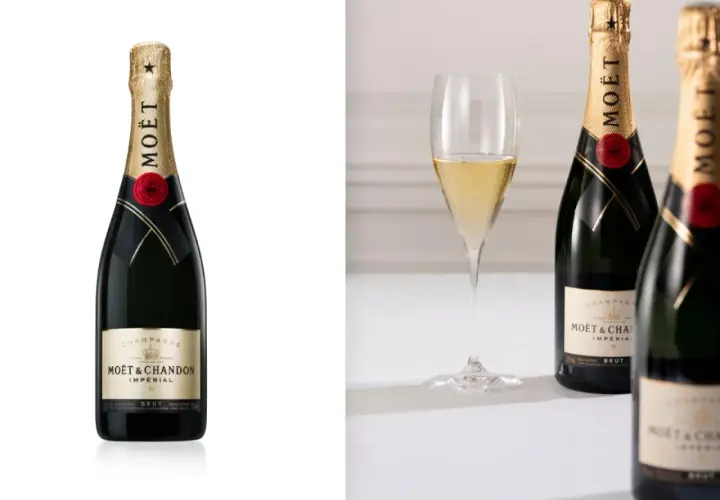 Zwei Flaschen Moët & Chandon Champagner, der beste Champagner der Welt, neben einem Glas prickelnden Champagners.